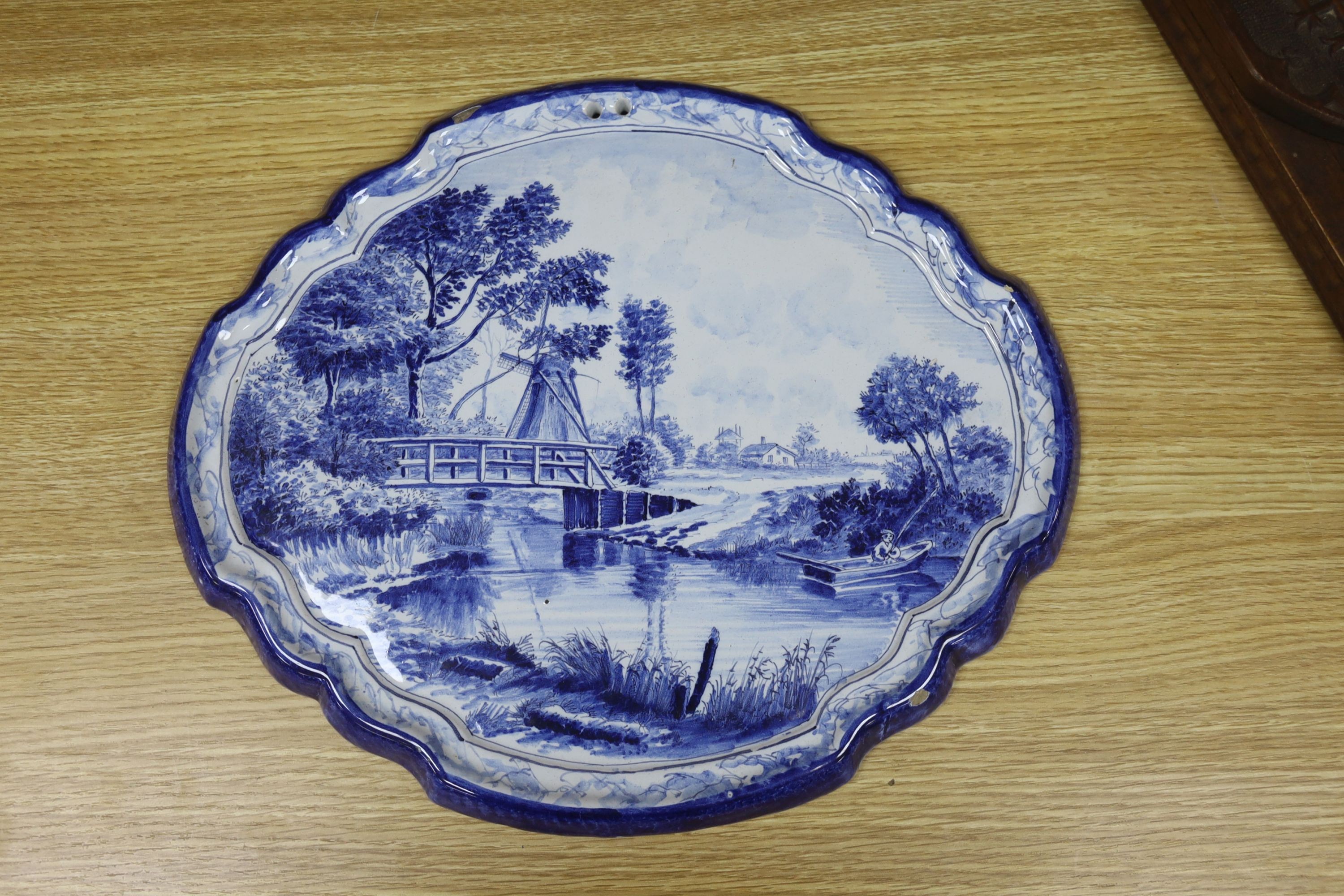 A Thoune, Swiss painted pottery dish, two Delft plaques and a Foresters jardiniere, largest 36cm